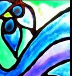 A close up photo of faux stained glass art. Heavy curved lines separate colors into abstract shapes. Photo courtesy of the Suzy Artsy Craftsy Sitcom blog