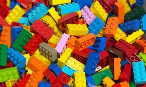 A close up photo of a mass of LEGO bricks jumbled together.
