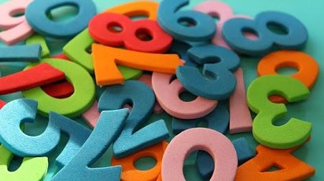 Photo of a pile of colorful felt numbers