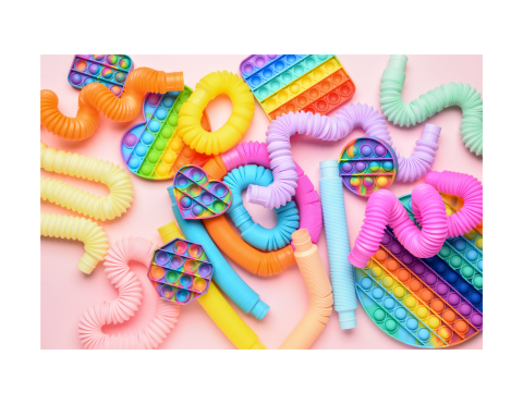 A variety of colorful accordion style fidgets and pop it fidgets.