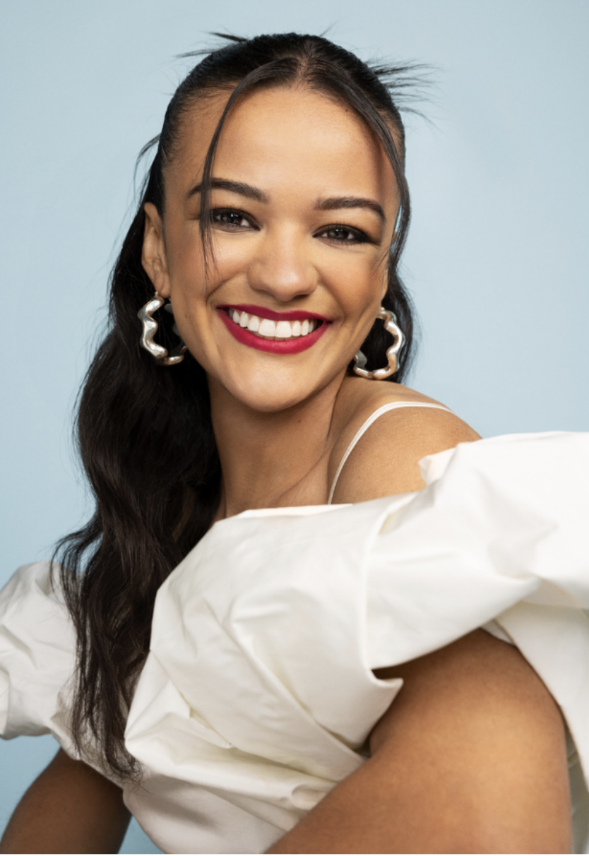 Smiling Marissa Bode in white dress