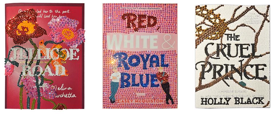 three book covers decorated with rhinestones