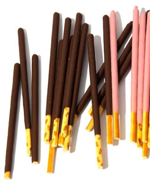 chocolate and strawberry pocky cookies on a white background